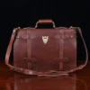 1943 Navigator Briefcase in Vintage Brown Steerhide - back view - on a wood table with a dark background