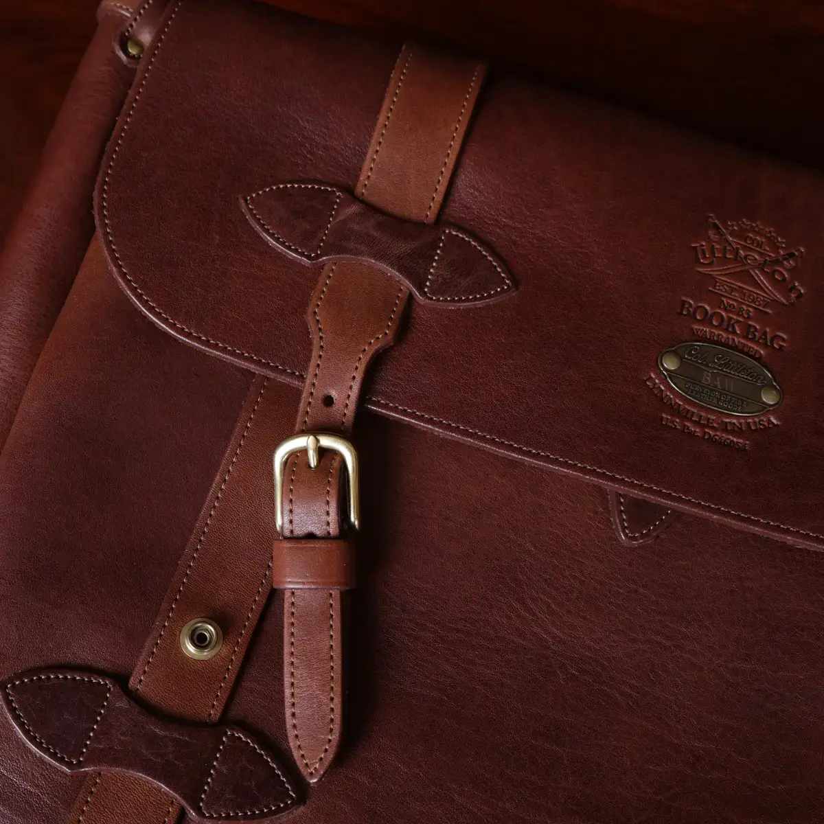 No 83 Messenger book back showing the clasp unbuttoned
