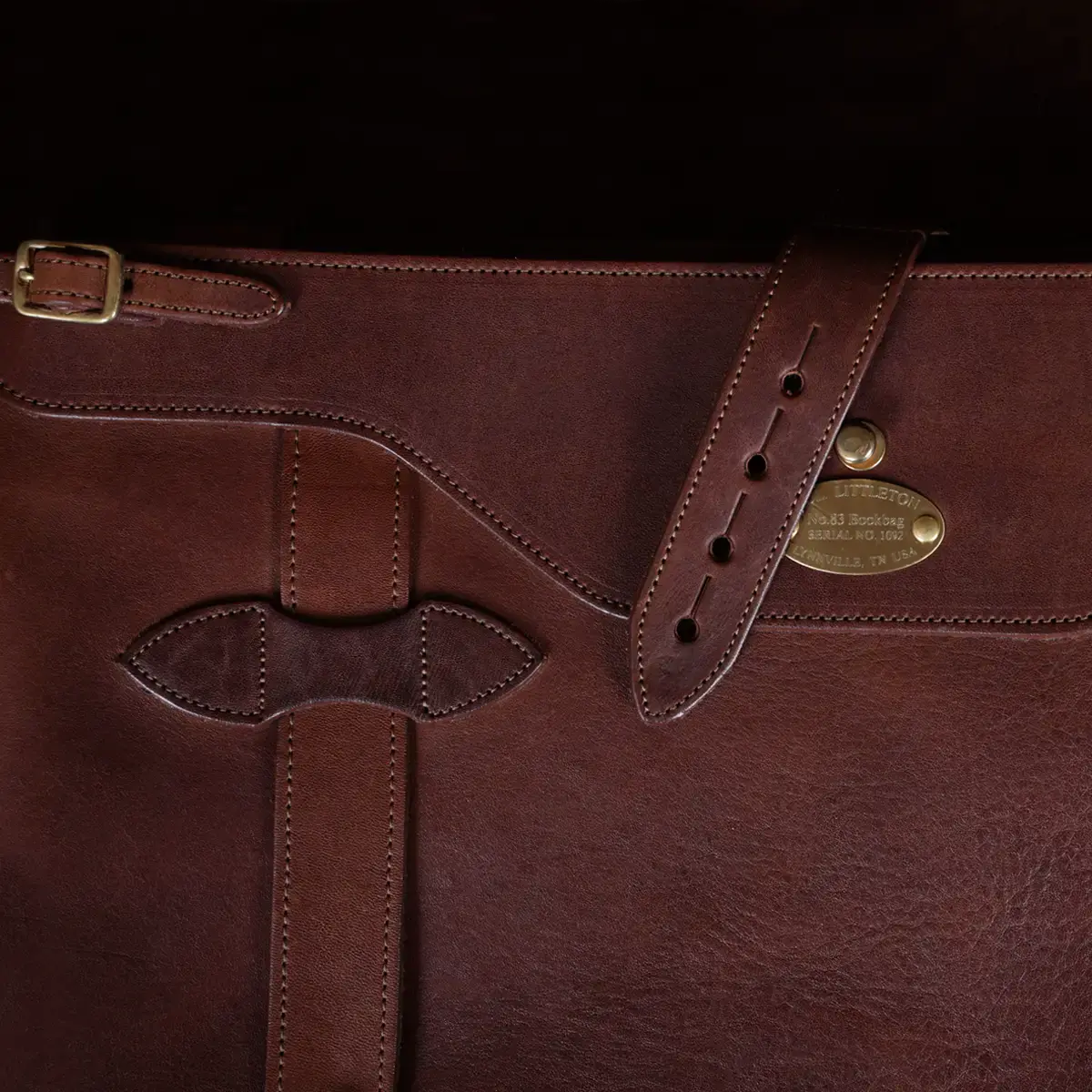 No 83 Messenger book back showing the pull tab unbuttoned