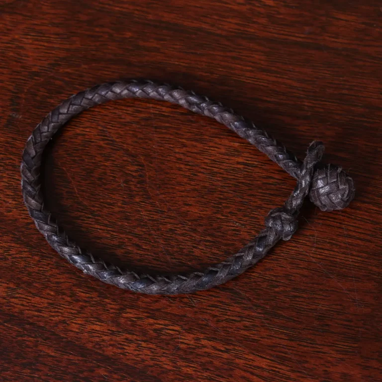 braided brown leather bracelet with and loop closure - top view