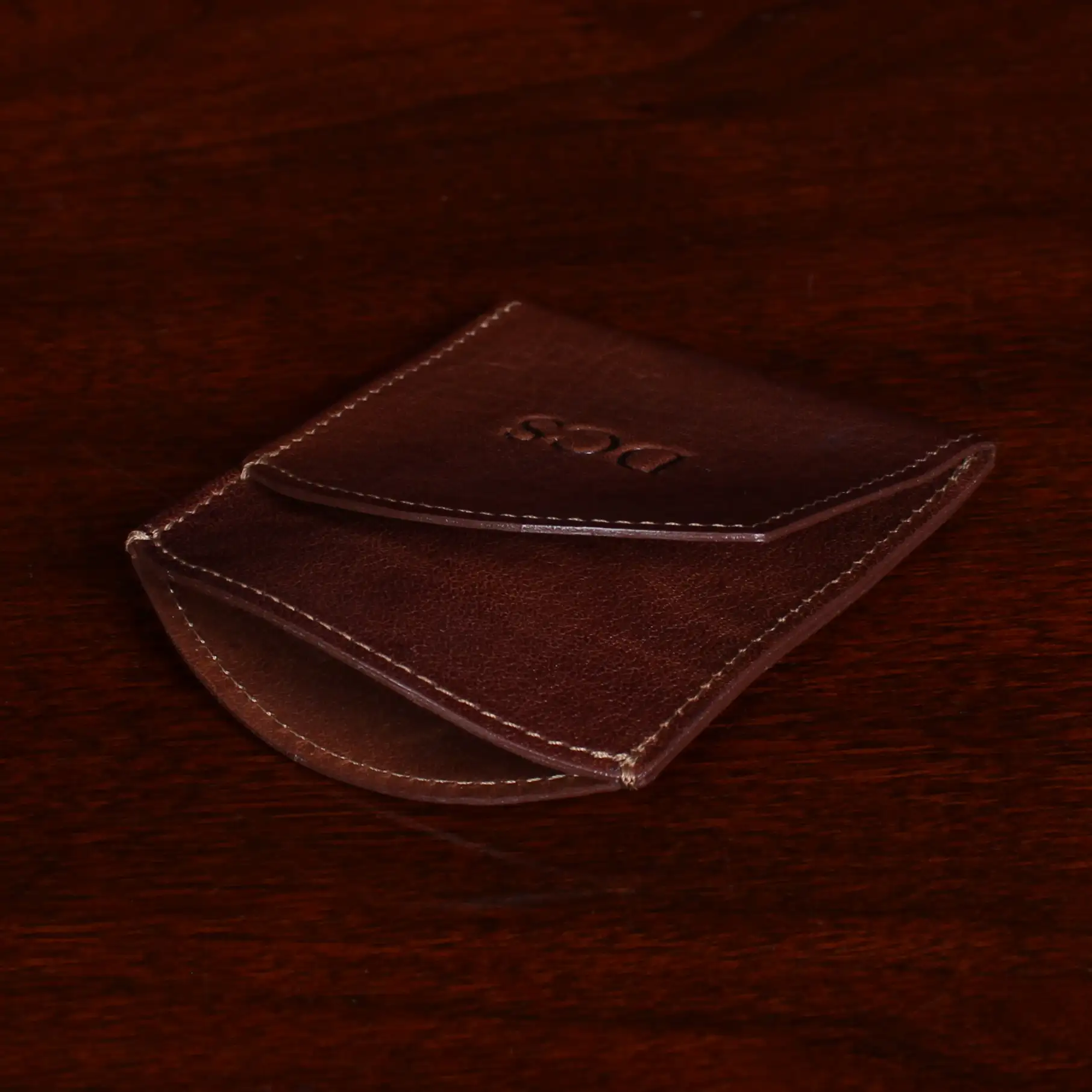 side of the vintage brown front pocket wallet