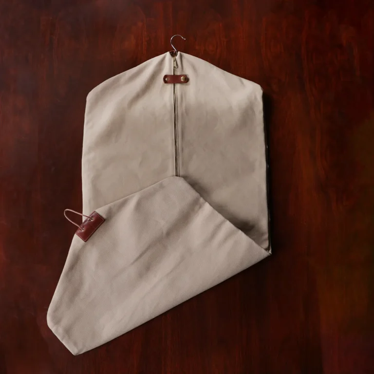 no7 khaki cotton canvas garment bag with brown leather strap - full front view with zipper