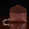 leather key wallet with ball stud closure with open view