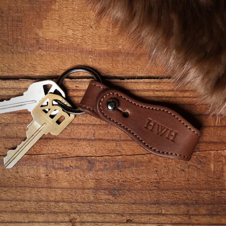 front side of No. 6 Brown Key Ring with 2 keys on a wooden box