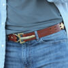 man wearing no5 vintage brown leather cinch belt with brass hardware