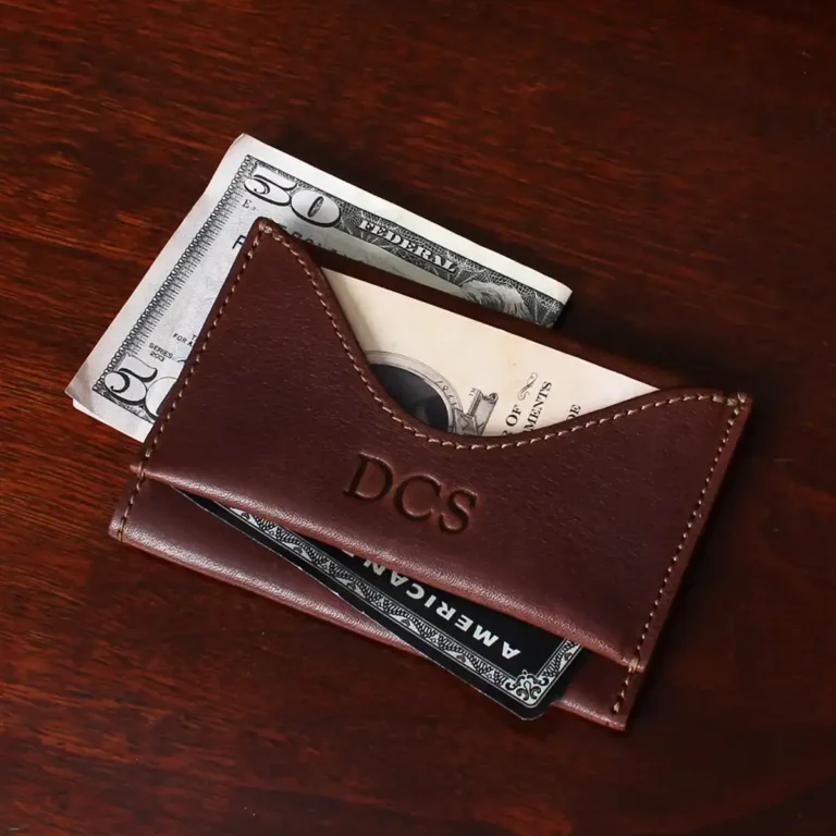 no 33 vintage brown wallet showing the front side with money