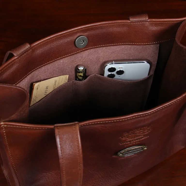 Wayfarer Tote showing the inside pockets for pens, phones and cards