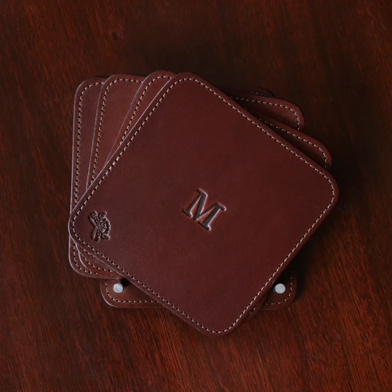 brown square leather coaster set in holder