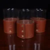 back view of leather veranda glass sleeves and glasses on wooden table with dark background