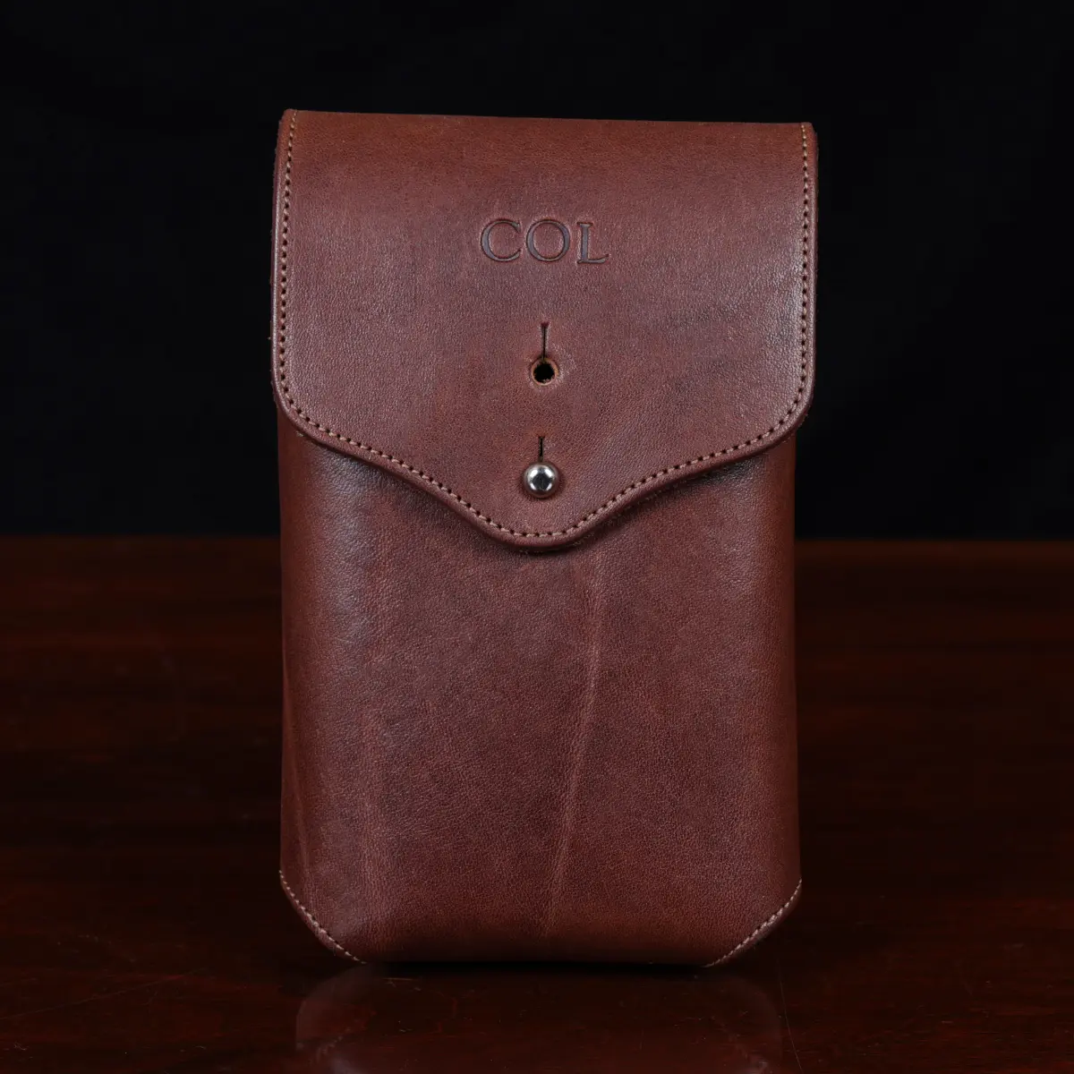 VERTICAL PHONE POUCH IN SHINY CALFSKIN - BLACK