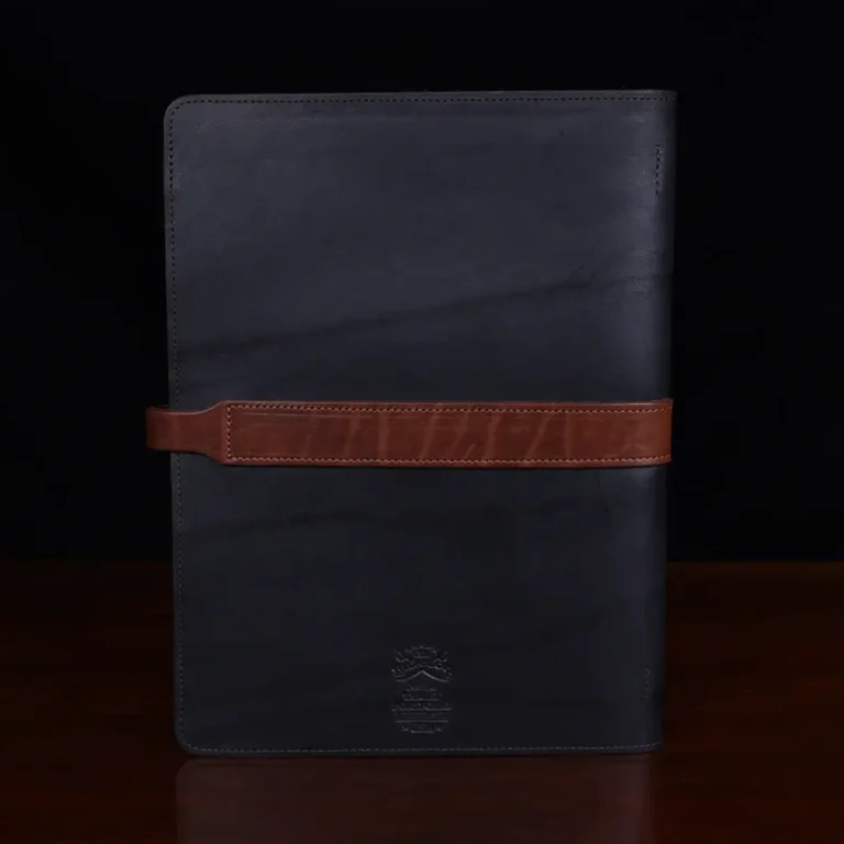 no 18 tablet portfolio in the color black and vintage brown showing the back