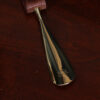No. 2 Shoehorn in brown American Alligator with brass hardware - detail view of etched logo