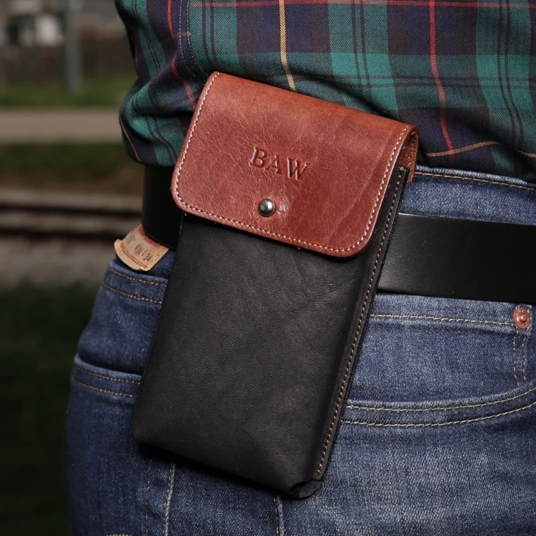 phone holster in vintage brown and black on a man belt