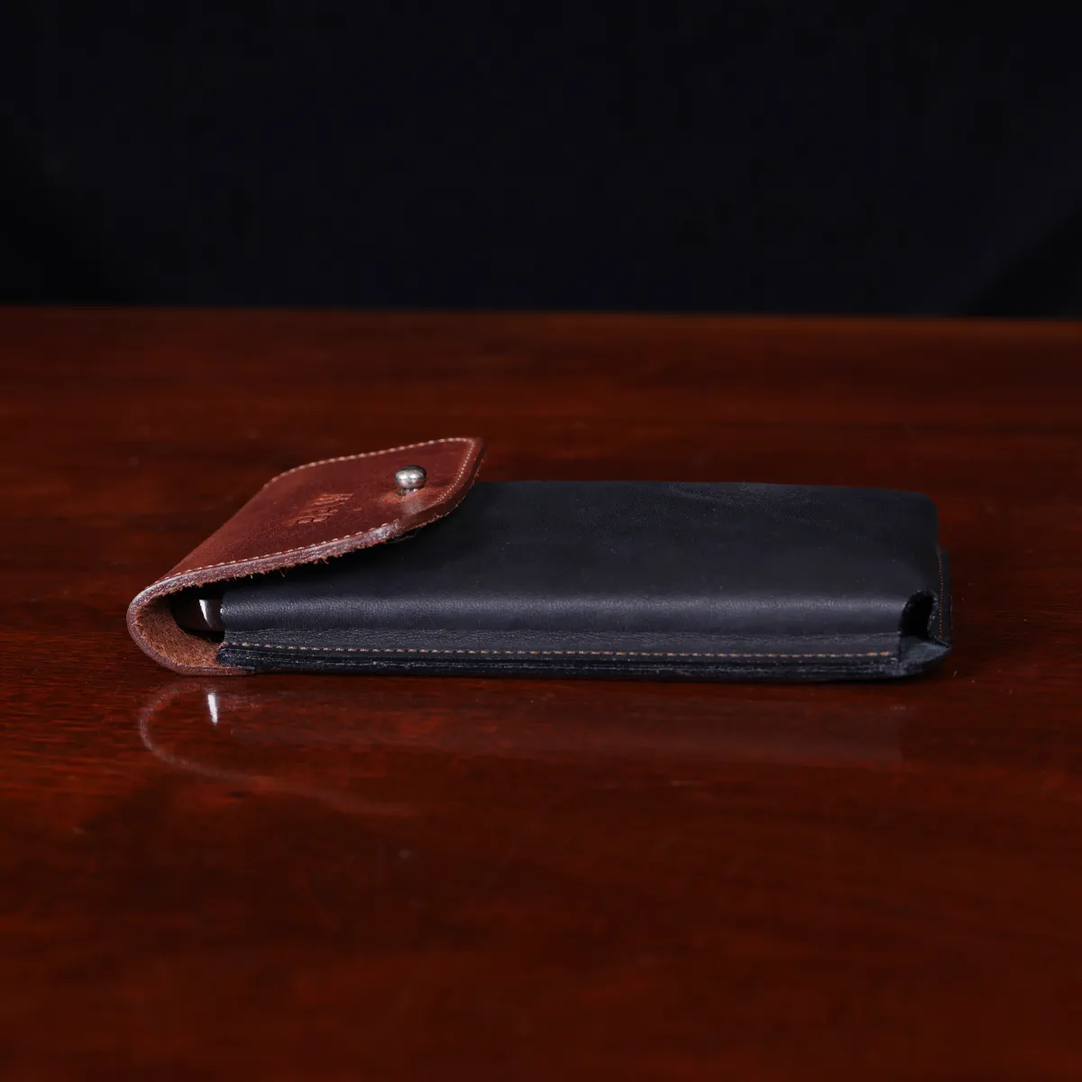 no60 brown and black large leather phone holster - side view