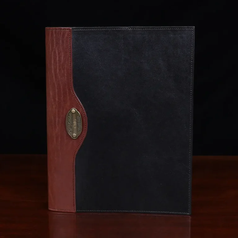 no 30 composition journal in the color black and vintage brown showing the front