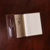 open composition journal notebook preview with a pencil and refill journal