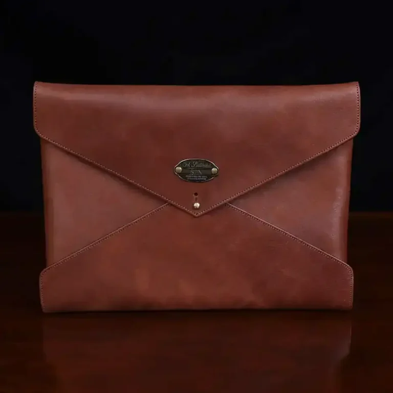 emissary envelope in vintage brown showing the front