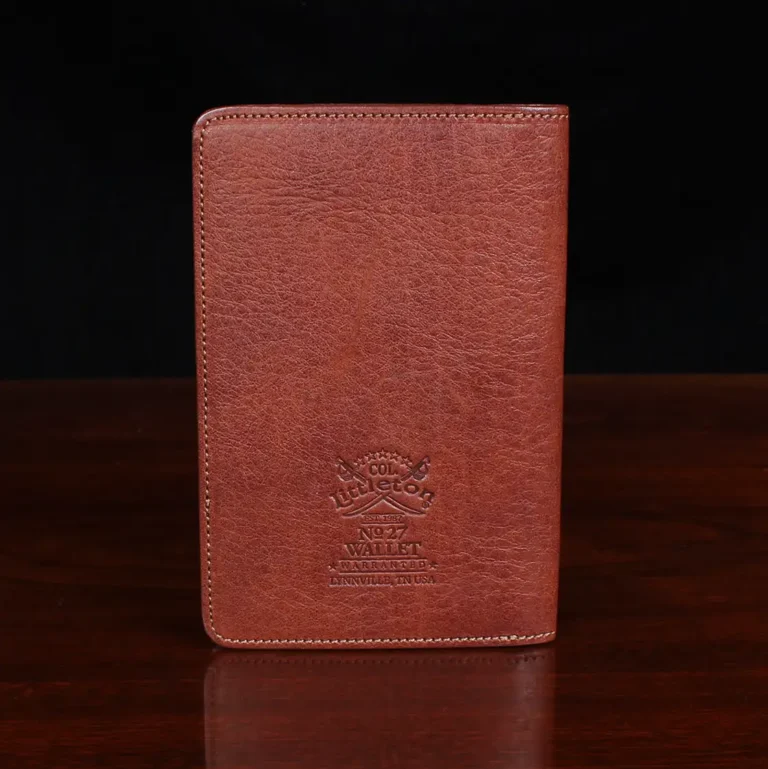 no27 vintage brown passport wallet back view with black background