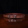 No. 4 Belt in American Alligator - X-Large - ID 001 - front view on a wooden table with black background