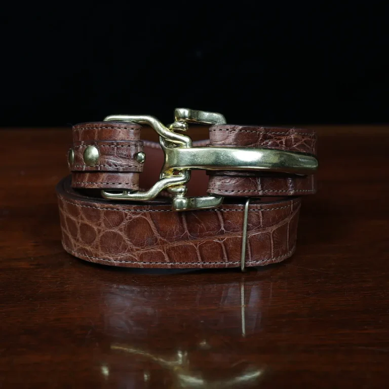 No. 5 Cinch Belt in brown American Alligator and brass buckle - ID 001 - front coiled view on black background