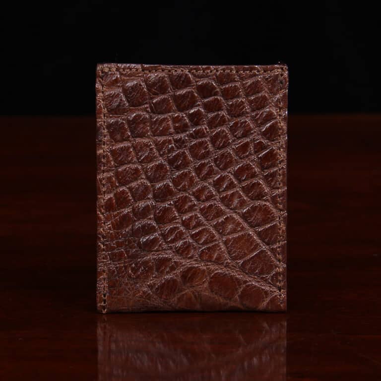 No. 4 Card Case in Vintage Brown American Alligator - ID 001 - front view cut out on No. 2 Card Wallet in Vintage Brown American Alligator - ID 001 - back view on a black background