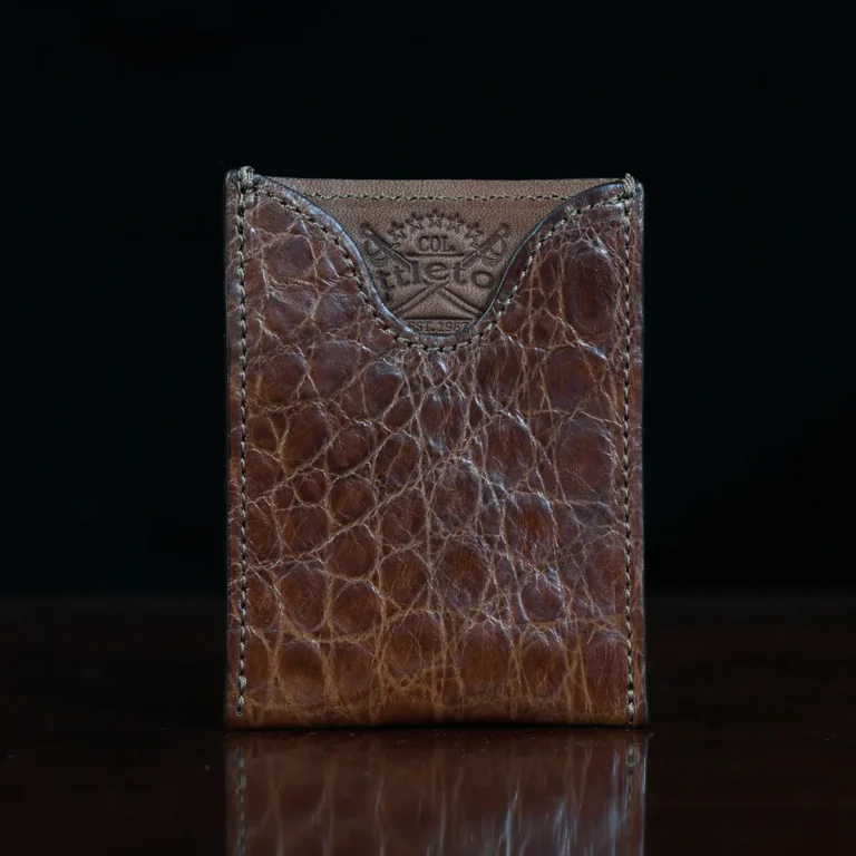 No. 4 Card Case in Vintage Brown American Alligator - ID 002 - front view on a wood table and dark background