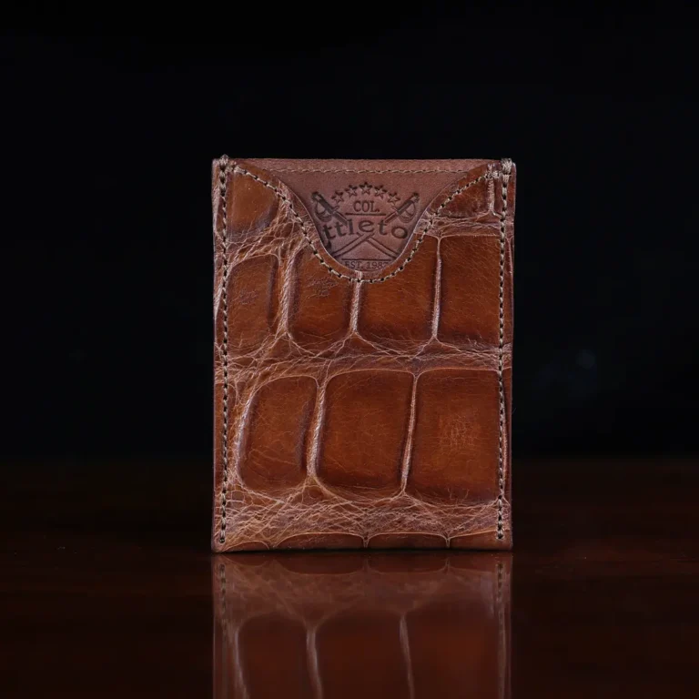 No. 4 Card Case in Vintage Brown American Alligator - ID 002 - front view on a wood table and dark background