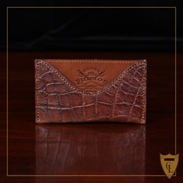 No. 3 Card Wallet in Vintage Brown American Alligator - ID 001 - front view cut out on No. 2 Card Wallet in Vintage Brown American Alligator - ID 001 - front view on a black background