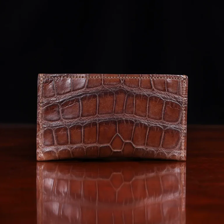 No. 3 Card Wallet in Vintage Brown American Alligator - ID 002 - front view cut out on No. 2 Card Wallet in Vintage Brown American Alligator - ID 001 - back view on a black background