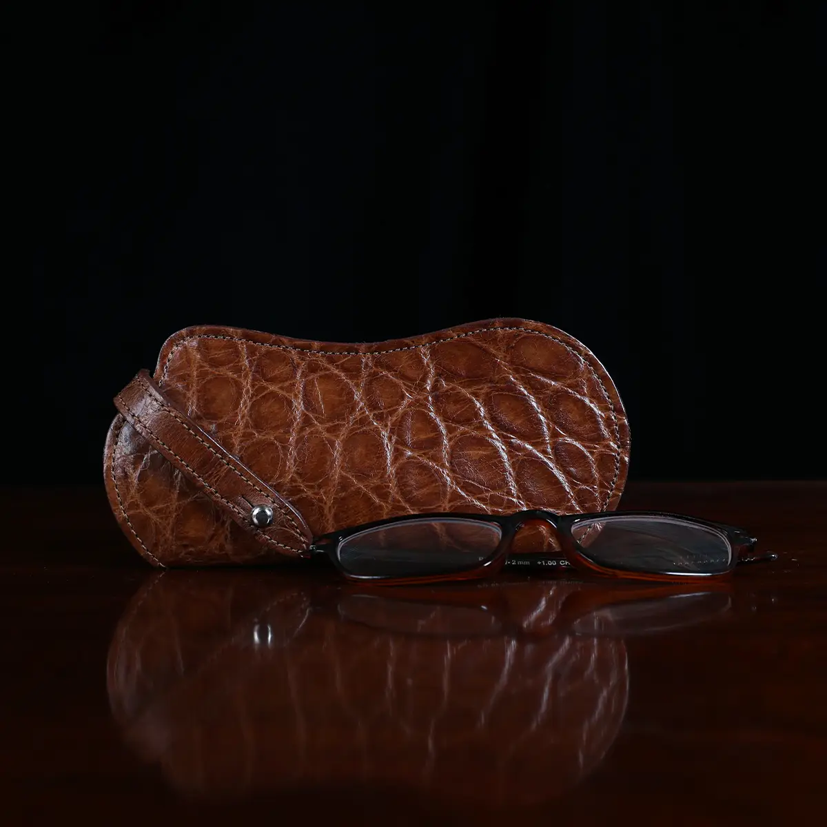 No. 2 Eyecase Glasses Case in Brown American Alligator with glasses- ID 001 - front view on black background