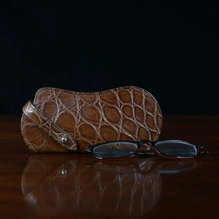 No. 2 Eyecase Glasses Case in Brown American Alligator with glasses- ID 001 - front view on black background
