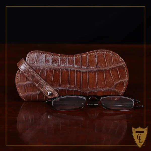 No. 2 Eyecase Glasses Case in Brown American Alligator - ID 002 - front view with a pair of reading glasses in front