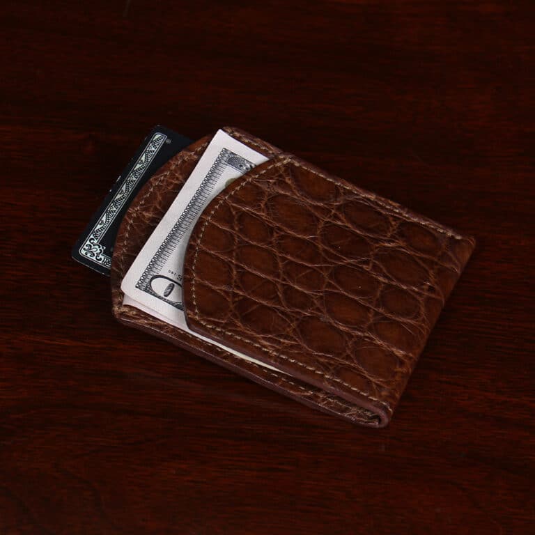 Front pocket wallet in brown American Alligator - ID 001 - side view with cash under front flap and credit card in back pocket