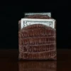 front pocket wallet in american alligator showing the front with cash and card - id 001