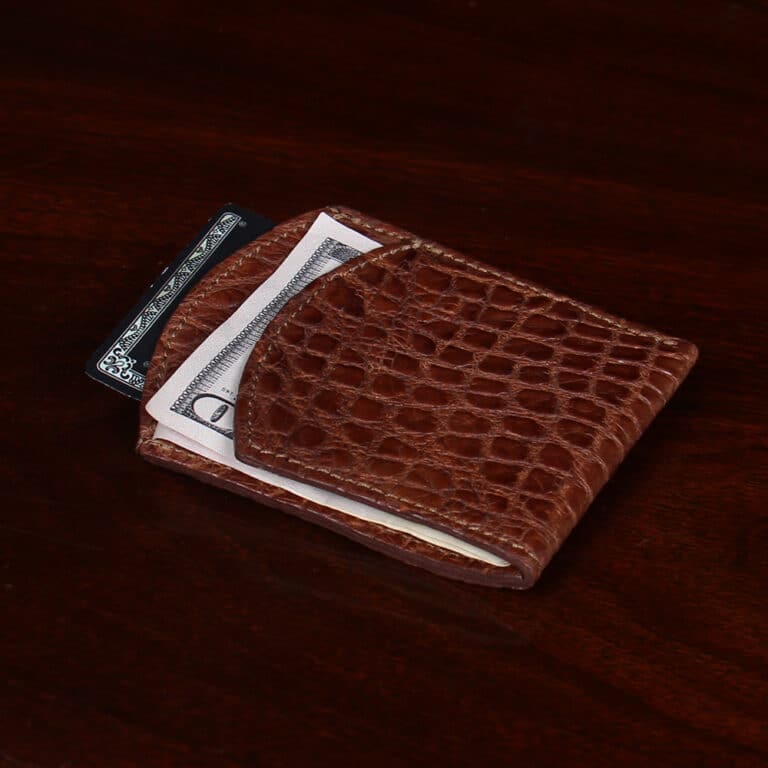 Front pocket wallet in brown American Alligator - ID 002 - side view with cash under front flap and credit card in back pocket