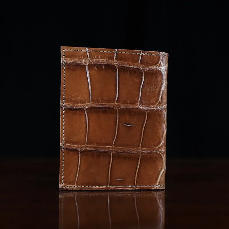 No. 4 Card Case in Vintage Brown American Alligator - ID 001 - back view on a wood table and dark background