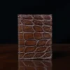 No. 2 Card Wallet in Vintage Brown American Alligator - ID 002 - back view on a black background