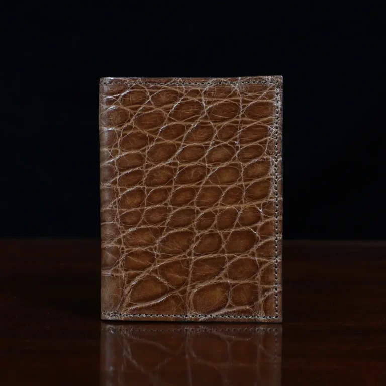 No. 4 Card Case in Vintage Brown American Alligator - ID 001 - front view on a wood table and dark background