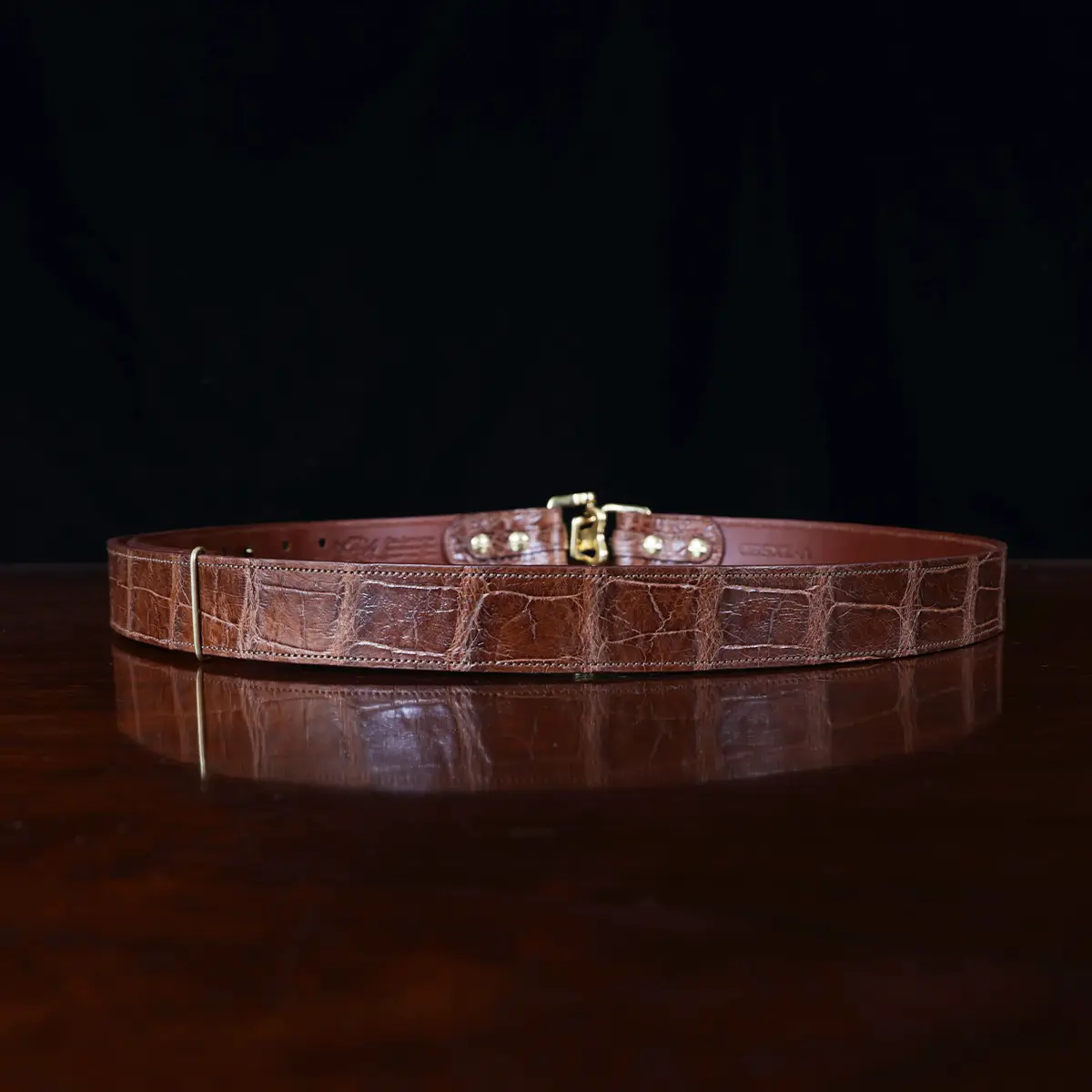 No. 5 Cinch Belt in brown American Alligator and brass buckle - ID 002 - back view on black background