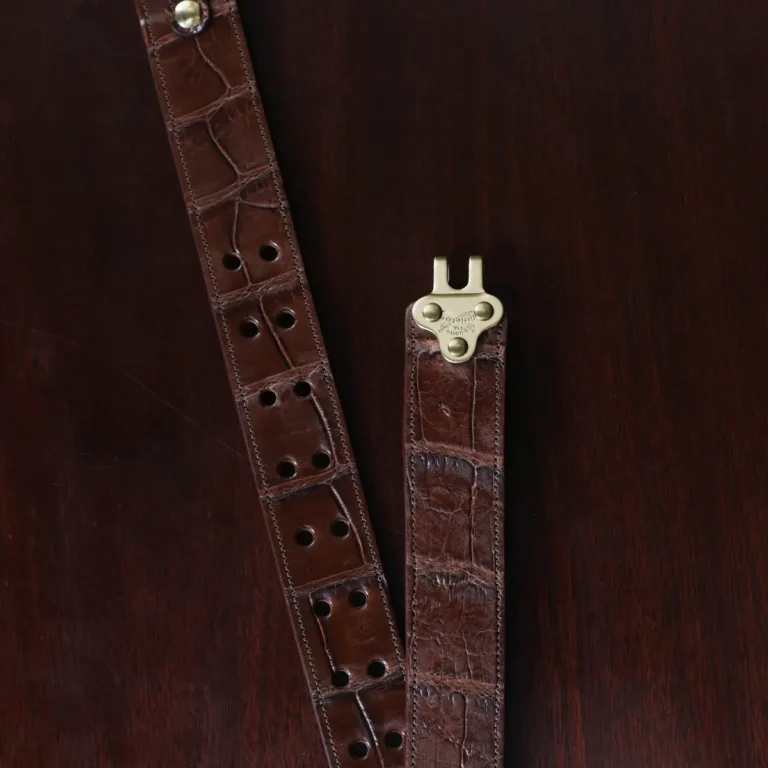 No. 5 Cinch Belt in brown American Alligator and brass buckle - ID 002 - hook view on black background