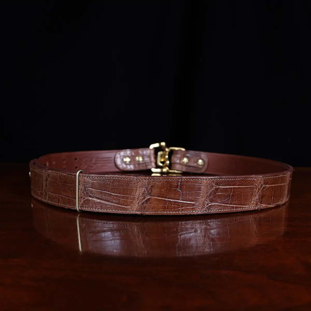 No. 5 Cinch Belt in brown American Alligator and brass buckle - ID 001 - back view on black background