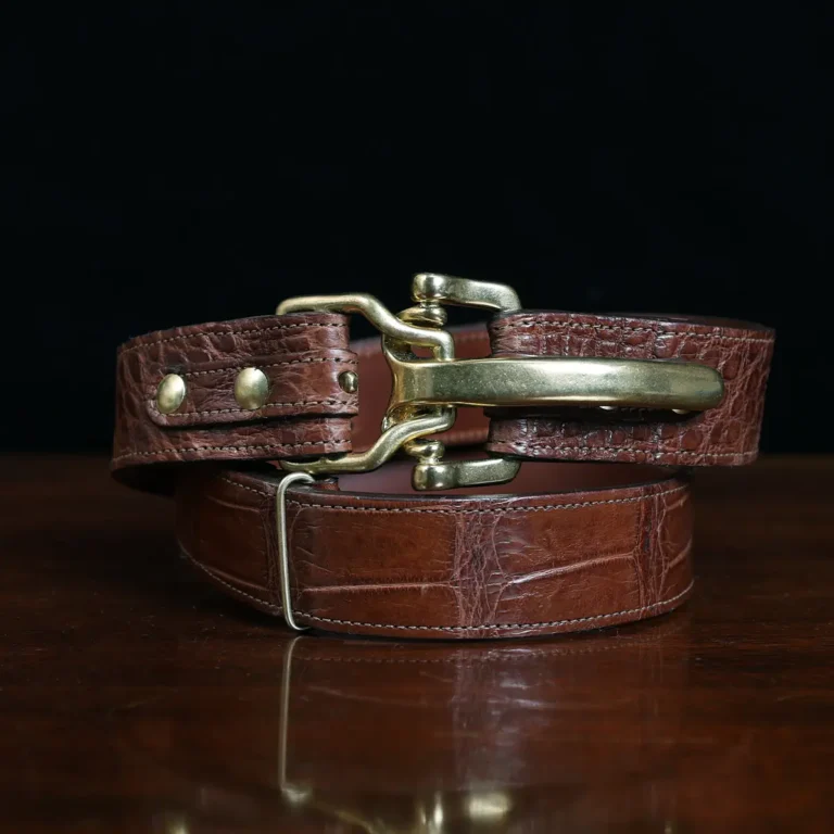 No. 5 Cinch Belt in brown American Alligator and brass buckle - ID 001 - front coiled view on black background