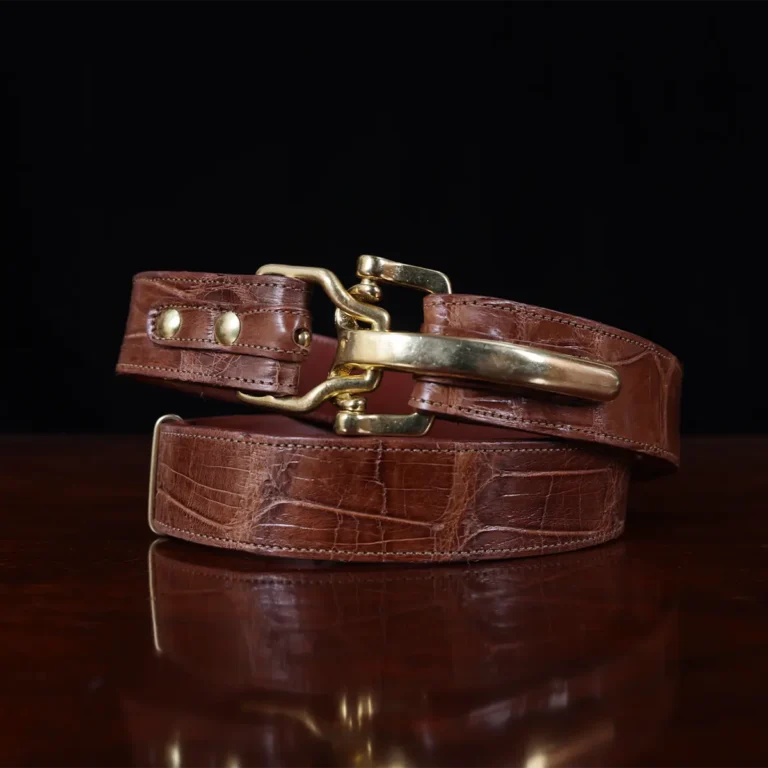 No. 5 Cinch Belt in brown American Alligator and brass buckle - ID 001 - front coiled view on black background