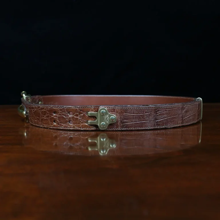 No. 5 Cinch Belt in brown American Alligator and brass buckle - ID 001 - side view on black background