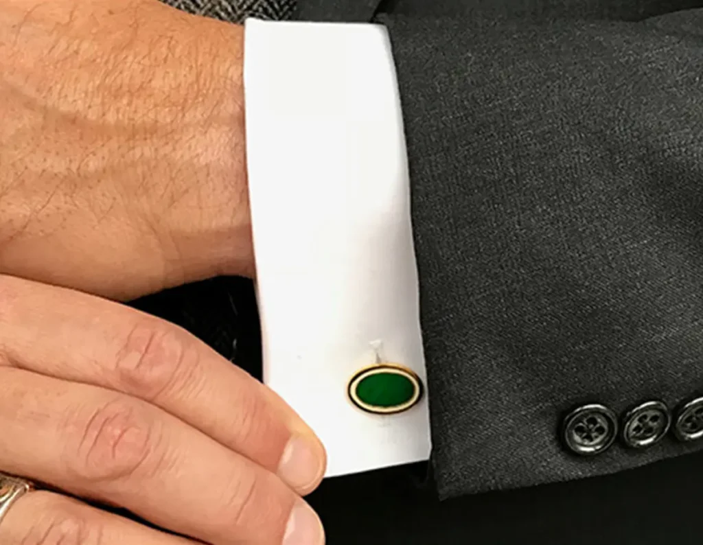 cuff link shown on a suit