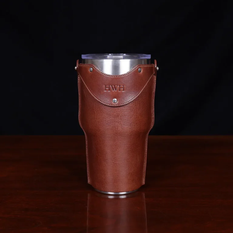 traveler leather tumbler sleeve in 30 oz on a wooden table
