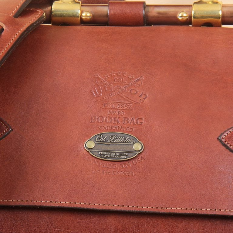 brown leather messenger book bag