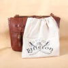 brown leather messenger book bag