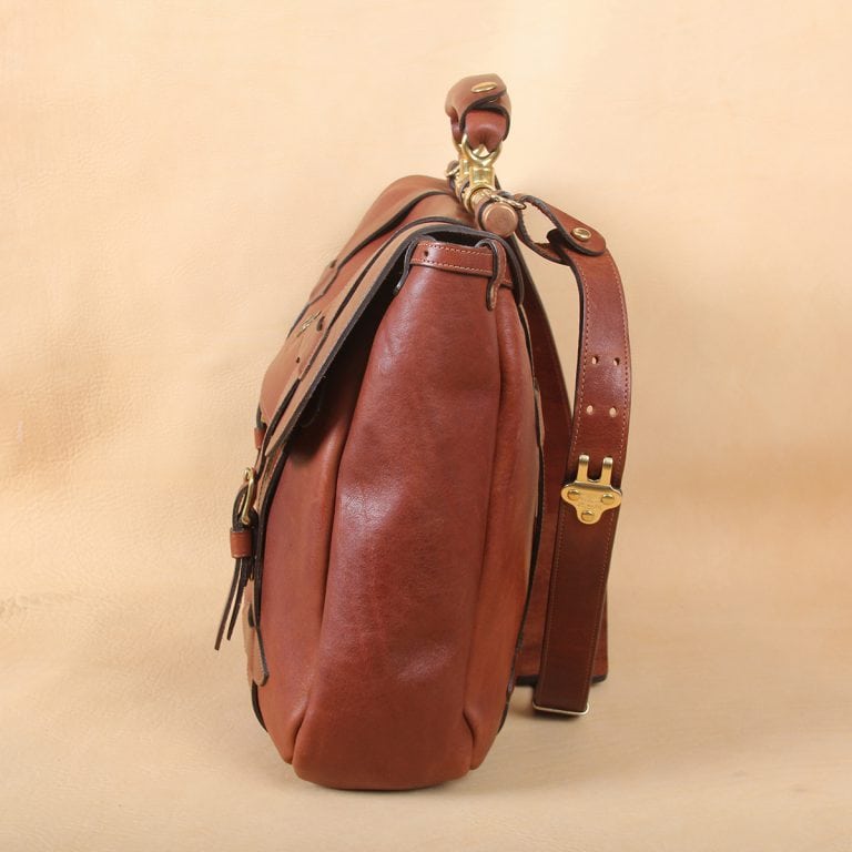 brown leather messenger book bag