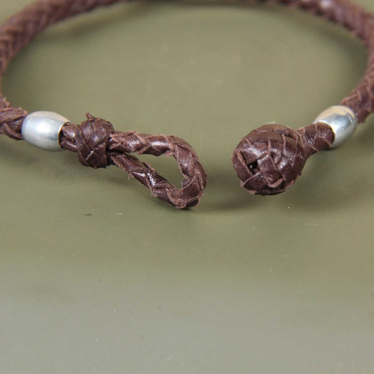 braided brown leather bracelet with pewter beads and loop closure
